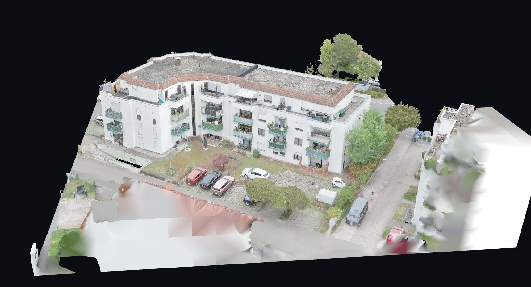 Texturiertes 3D-Modell eines Mehrfamilienhauses mit Hof, aus Drohnenaufnahmen berechnet